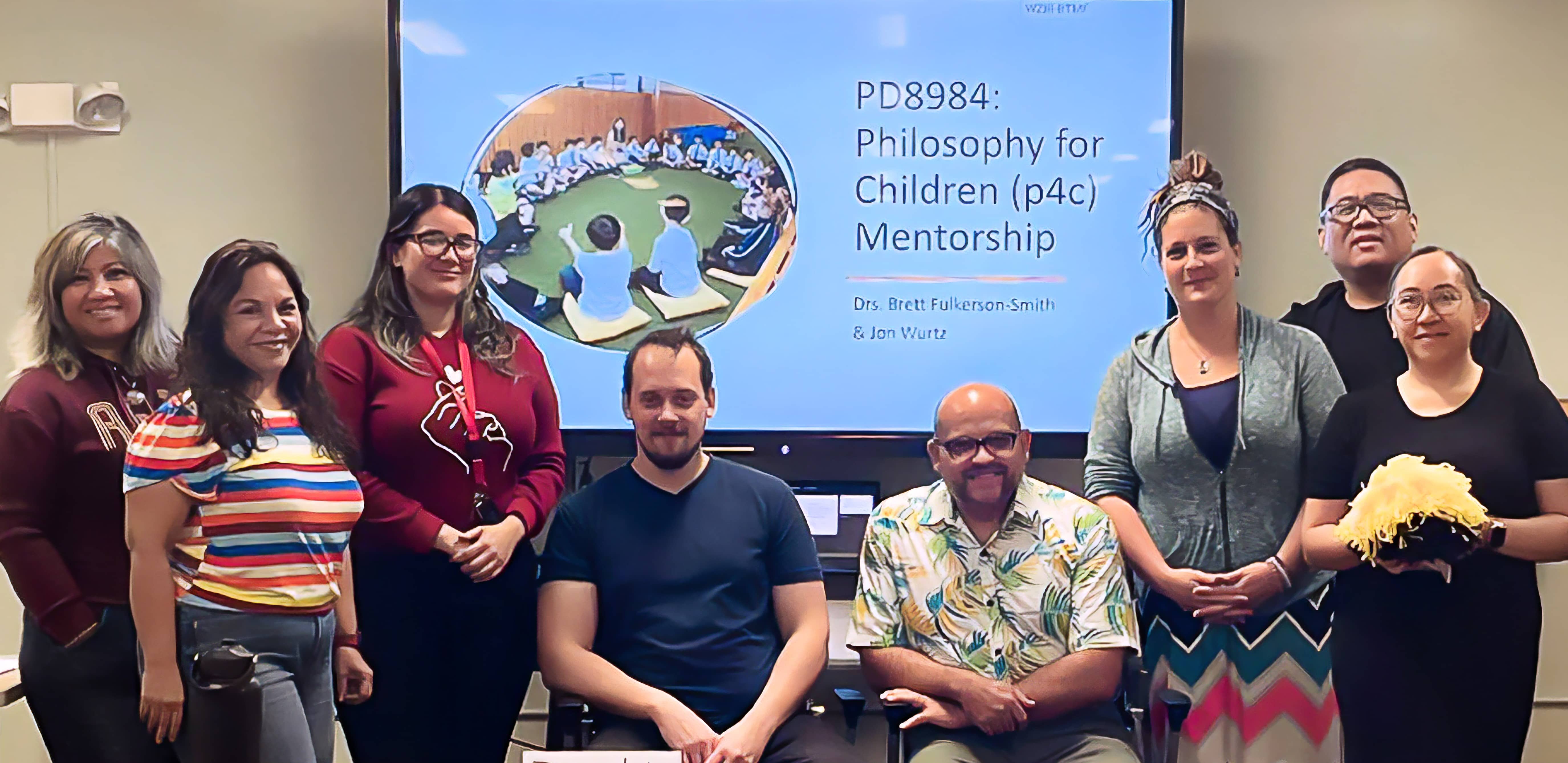Philosophy professors and students posed for a photo
