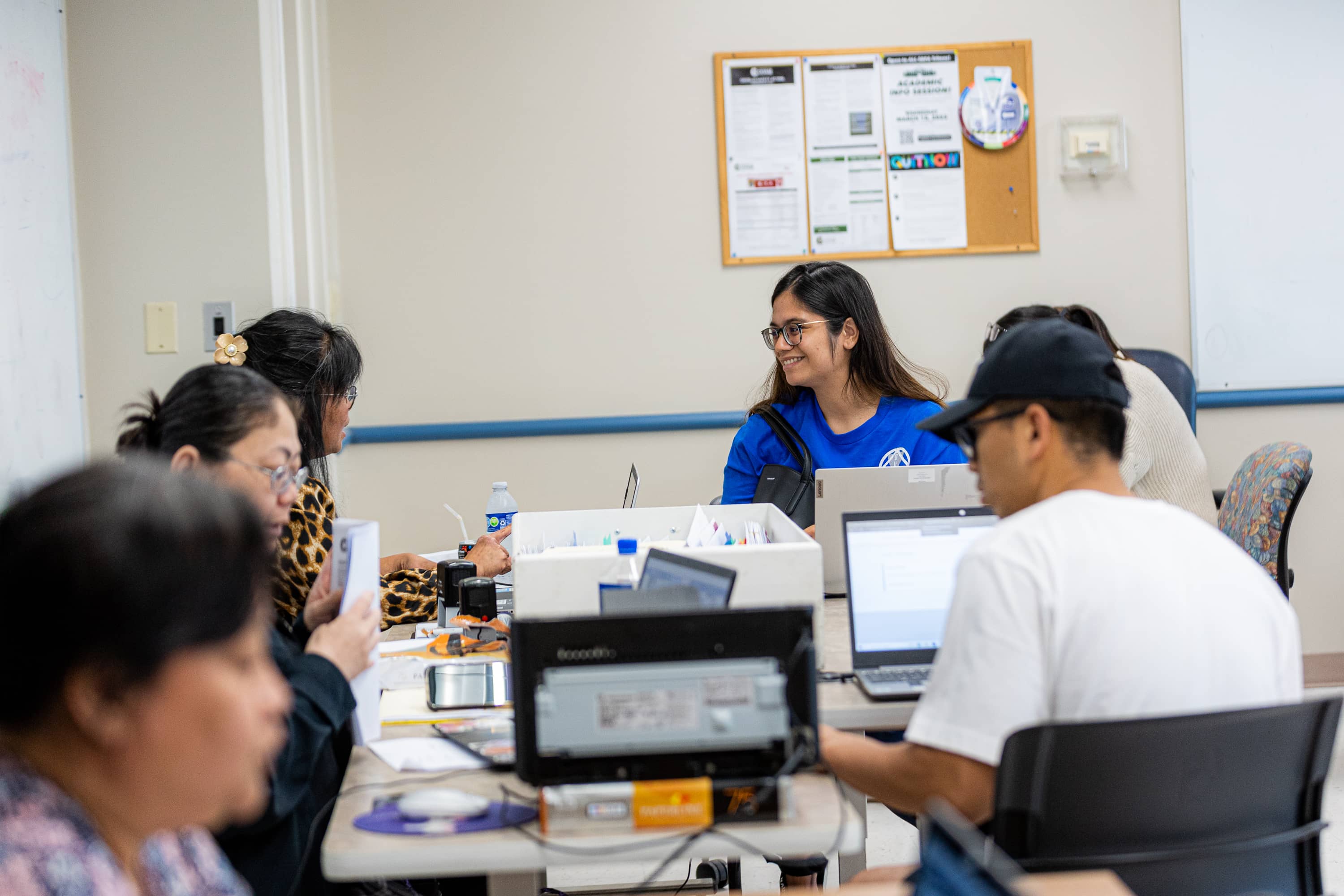 Admissions and Records team assisting students