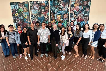 Members of SBPA's faculty, staff, and students pose for a photo with Michael Ysrael 