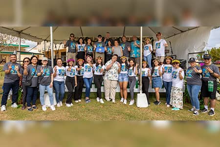 Members of UOG's Admin, SGA officers, senators, and others pose for a picture on Charter Day 2023