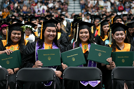 Photo of students at the UOG in Fanomñakan 2023 commencement.