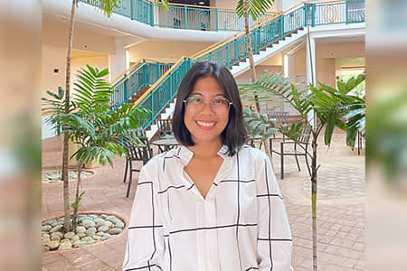 Dona Silang poses for a photo at UOG Business building.