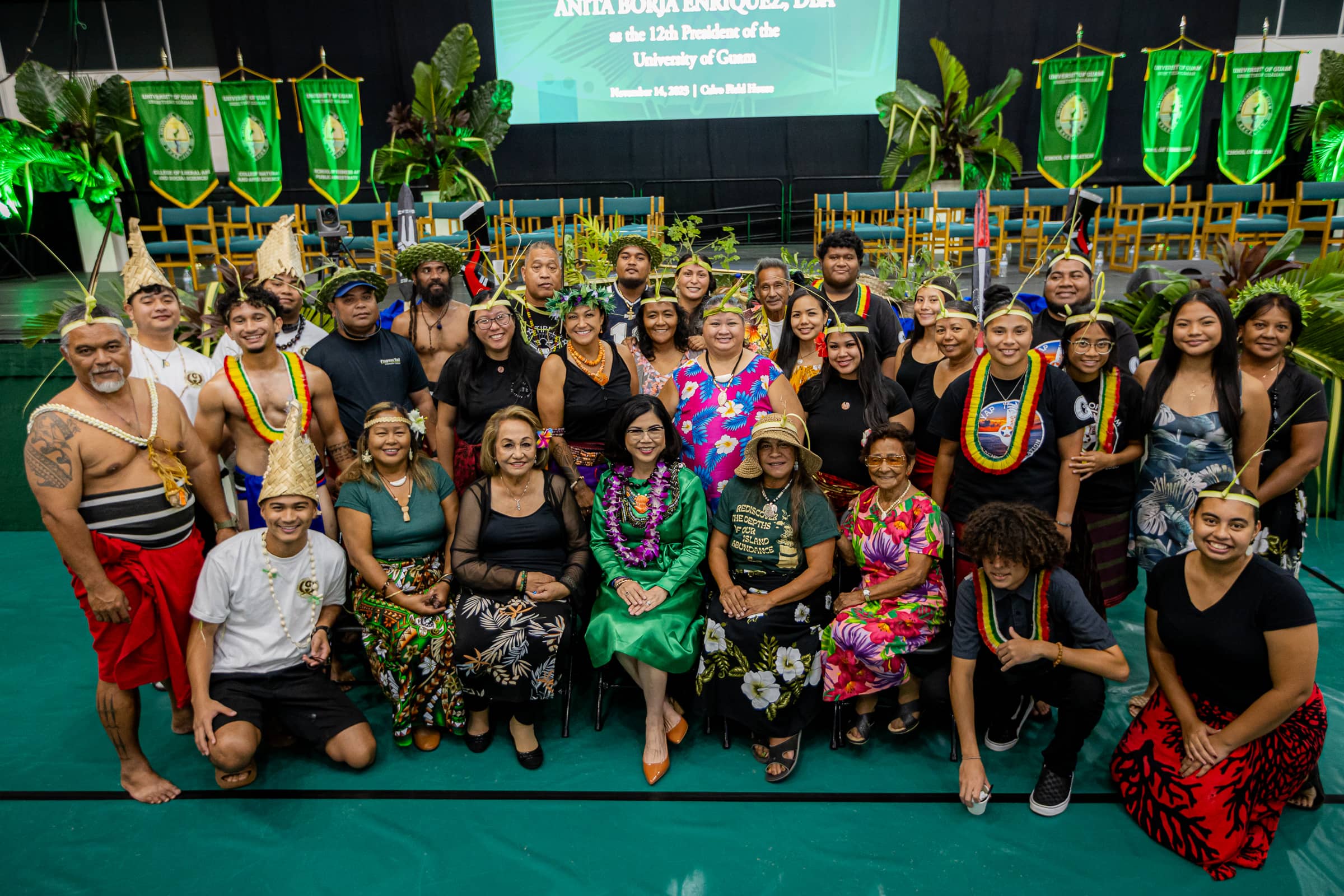Members of the University of Guam community gather for a photo with Dr. Anita Borja Enriquez, 12th President of the University of Guam, after her investiture on Tuesday, Nov. 14, at the Calvo Field House. 