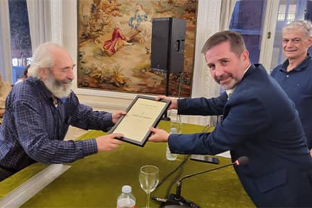 Dr. David Atienza gives Ramon Hernandez award at Centro Riojano in Madrid, Spain