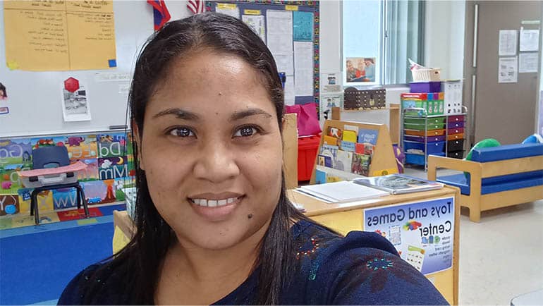 Margaret Choffat poses for a photo in her classroom.