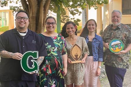 CHamoru studies program members and UOG admin pose for a photo at 900k grant awarding