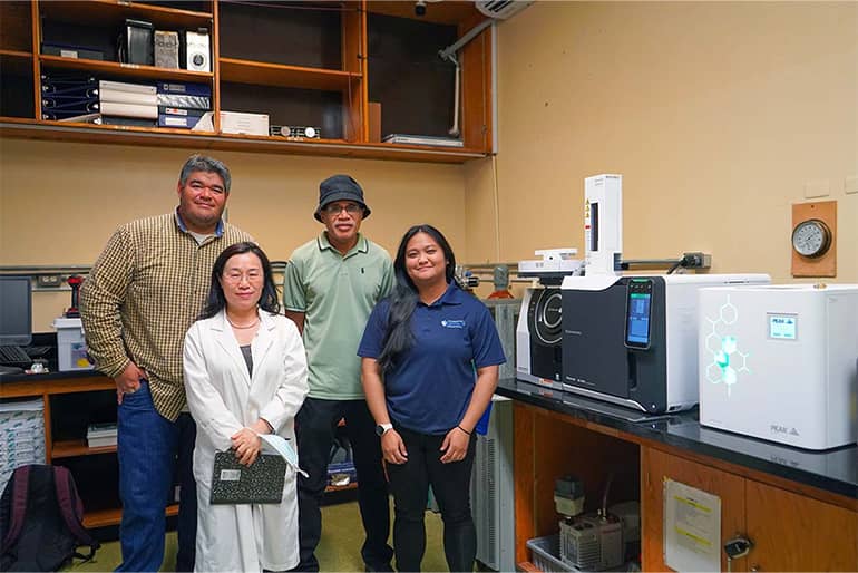Dr. Limtiaco, Dr. Wu, Dr. Vuki, and Ezra Cervera pose for a photo in UOG’s Chemistry and Teaching & Instrumentation Lab