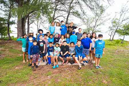 4-H summer camp kids pose for a photo