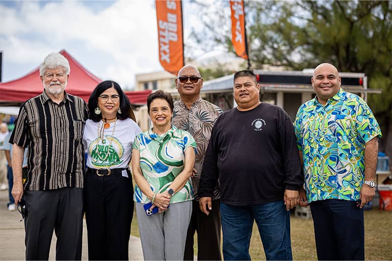 UOG President Anita Borja Enriquez poses for photo with several community leaders at 56th charter day.