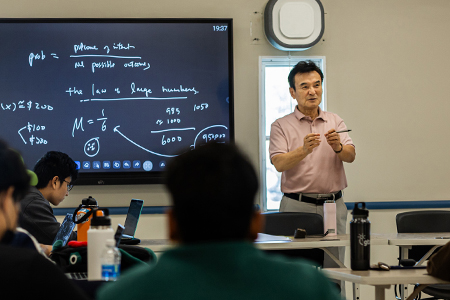 UOG Instructor teaching in a class