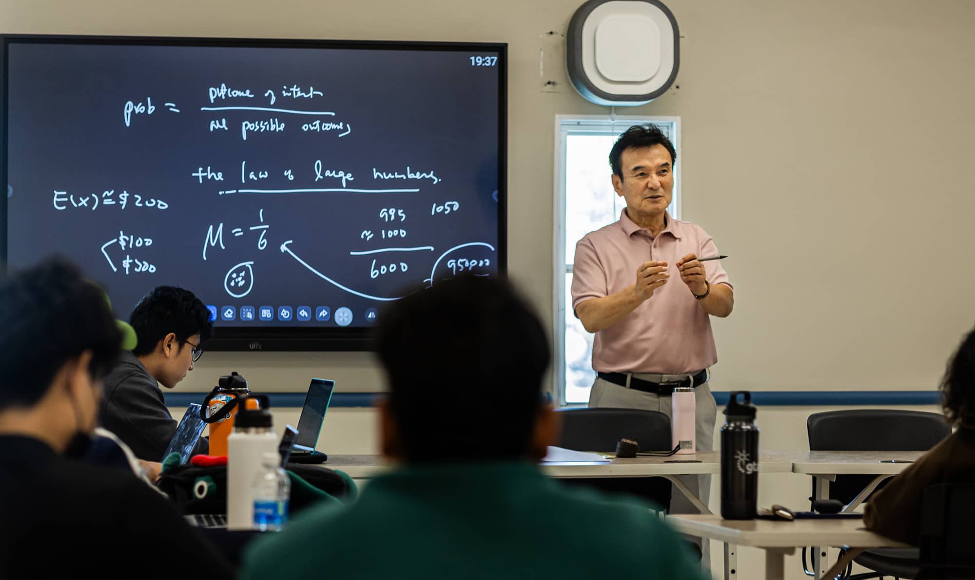 UOG Instructor teaching in a class