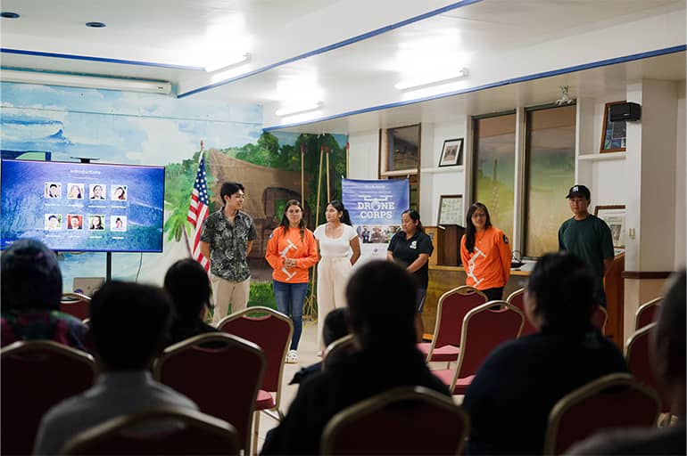 UOG students and staff talk about UOG Drone Corps program at Palau Community College Assembly Hall.