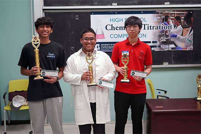 Individual award winners of Chemistry Titration Competition at UOG pose for a photo with awards