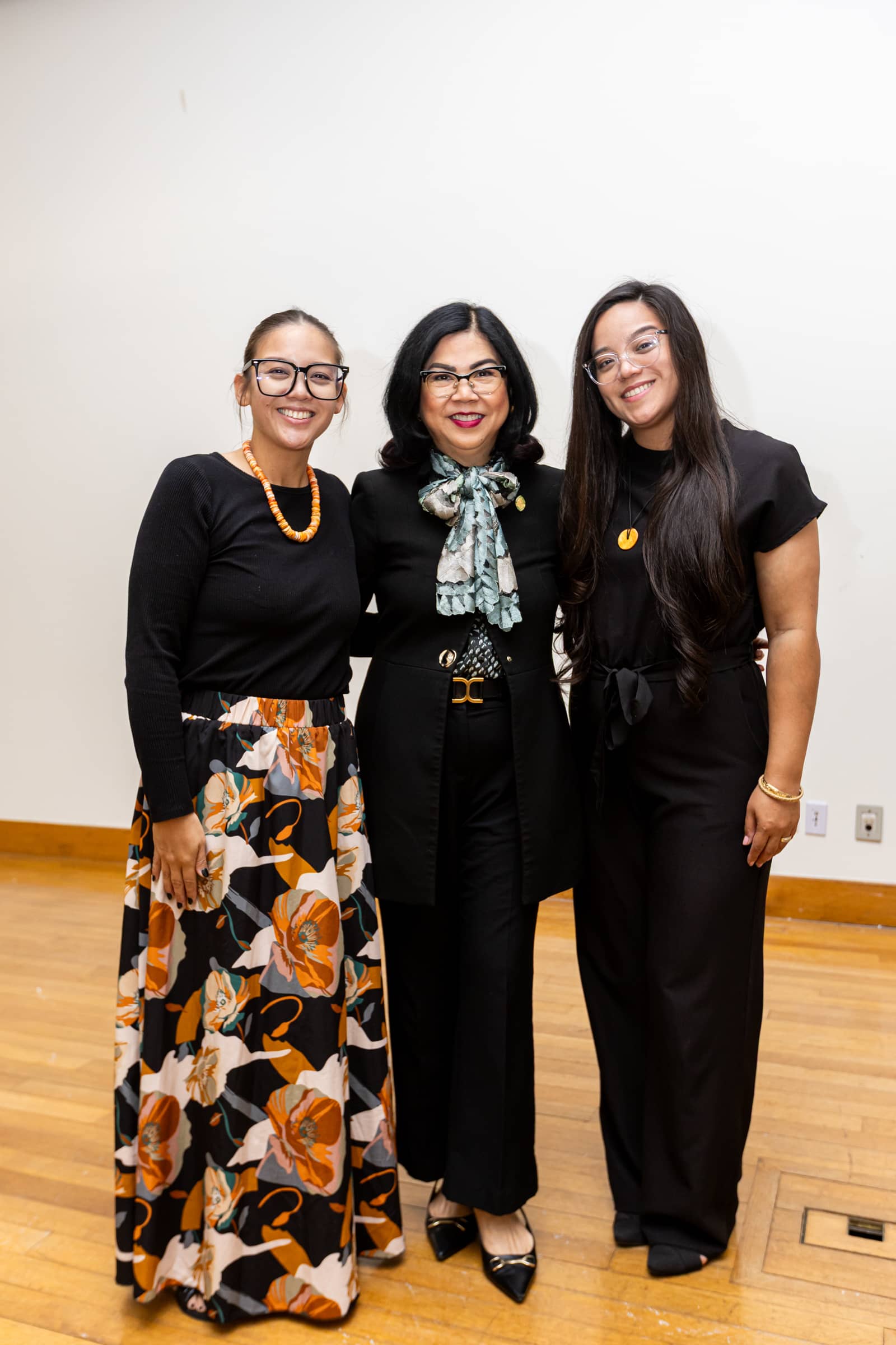  UOG President Anita Borja Enriquez stands with Drew Ann Laguaña (left) and Jerusa Laguaña (right) following the scholarship announcement ceremony. Photo courtesy of the University of Guam