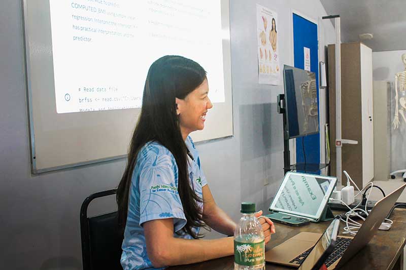 A graduate student teaching a workshop on data science