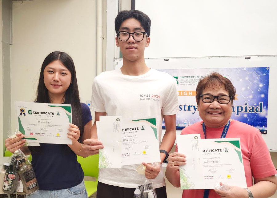 Photo of 3 winners holding certificates