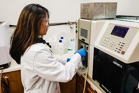 A lab assistant at the UOG WERI
