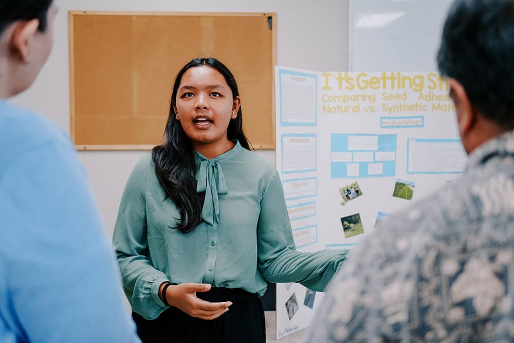 Marley Aldan presenting her project