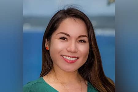 Kalyne Roberto portrait photo in front of ocean view