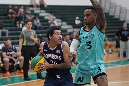 KFC bombers player protects ball from opponent