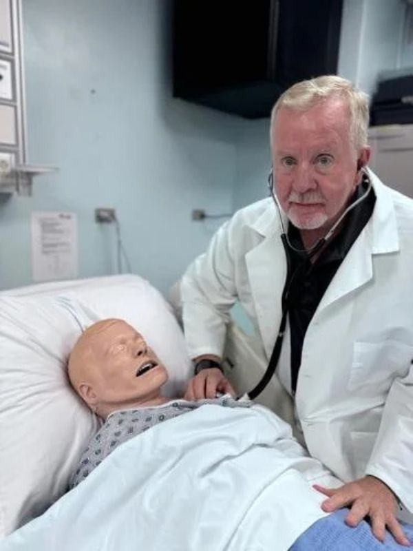 Dr. David J. Dunham conducts a manikin demonstration.