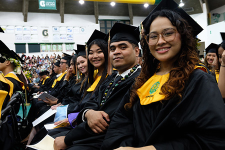 Graduates pose for a photo