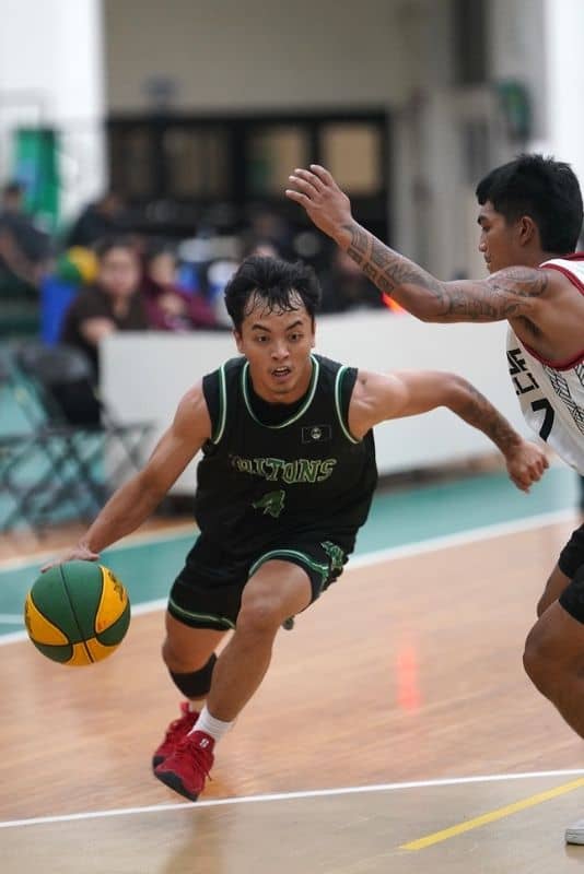 UOG Triton drives the ball.