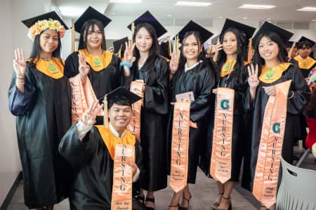 Nursing graduates gather for a photo before the start of the Fañomnåkan 2026 Commencement Ceremony