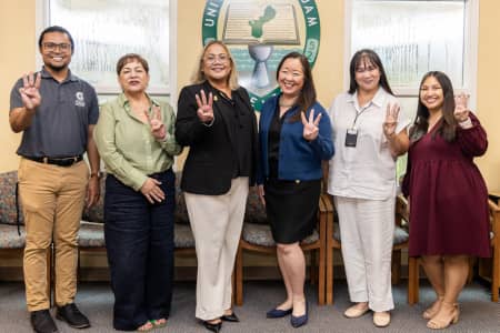 Representatives from the University of Guam and Goodwind Development Corporation 