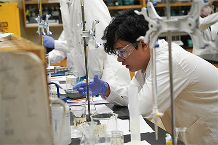 36 high school students competed on lab skills and precision in UOG's annual titration competition. 