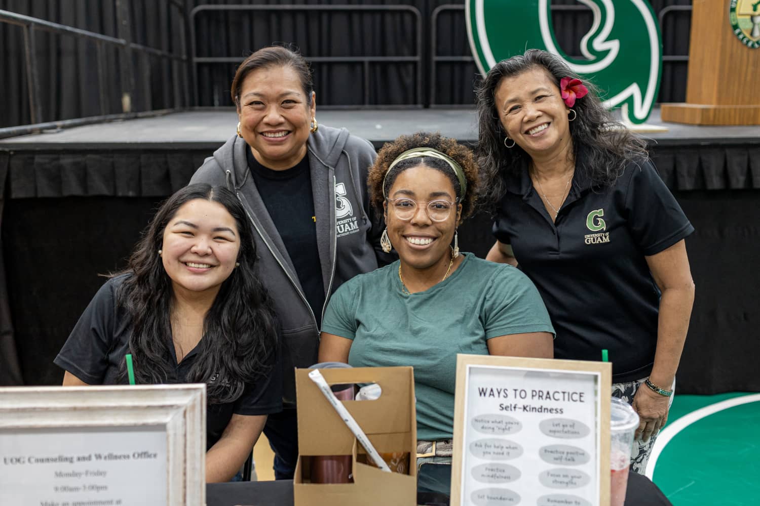 Venus Ituralde joins her UOG colleagues at the Spring 2025 New and Transfer Student Orientation