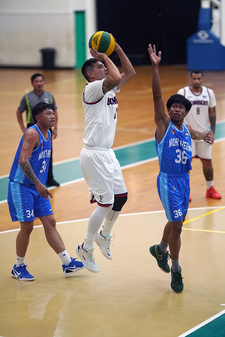 KFC Bombers player shoots a mid-range jumper