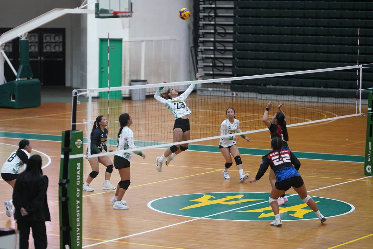 Lady Tritons is about to serve.