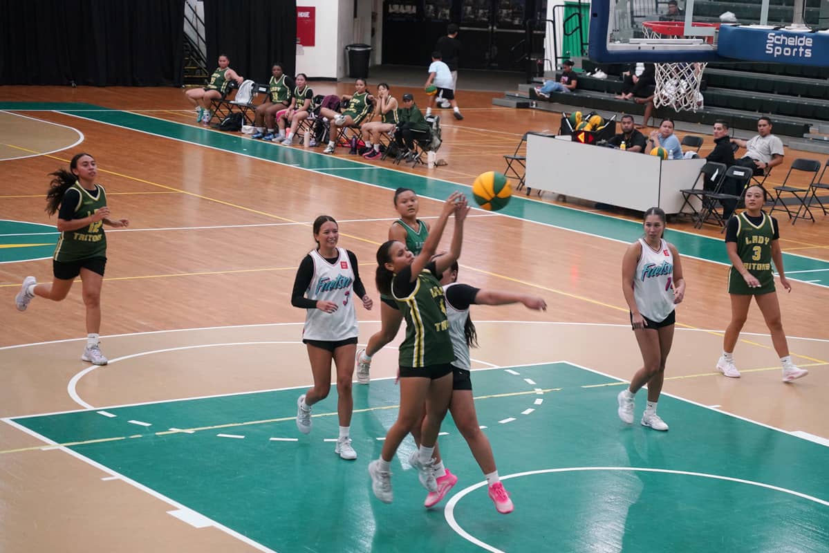 Lady Triton taking the shot