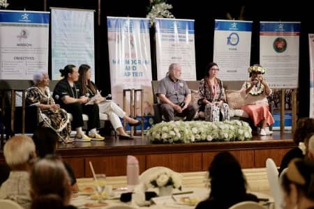Panelists speak during the Guam Cancer Survivorship Conference 2026