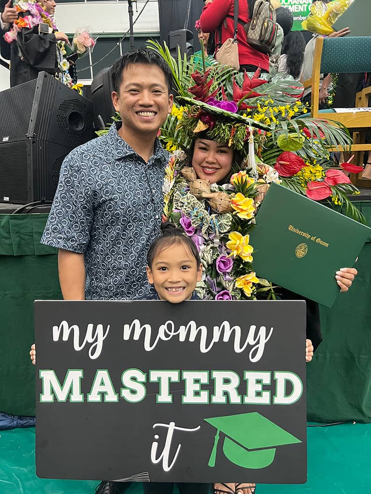 Makaelah Blas with family during graduation ceremony