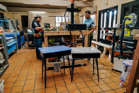 The G3 Makerspace & Innovation Hub team operates a machine
