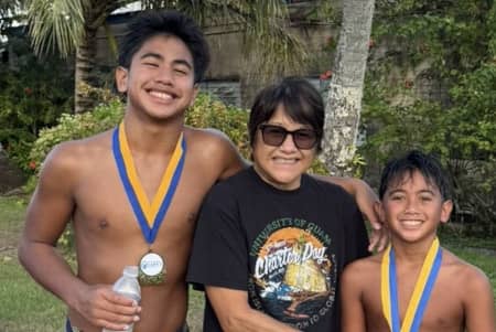 Lolita SN Taitano (center) with her “greatest motivation” — her grandsons