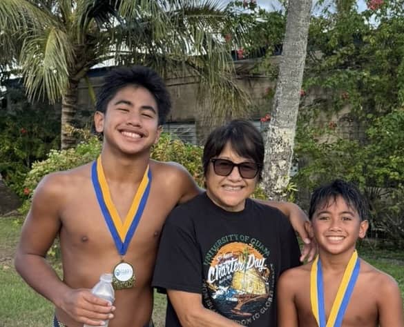  Lolita SN Taitano (center) with her her grandsons