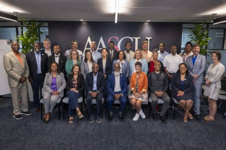 Dr. Sharleen Santos-Bamba poses with the rest of 2026-2027 Millennium Leadership Initiative cohort 