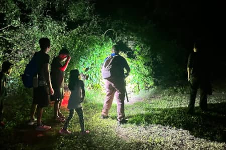 Over 125 community members joined NAVFAC Marianas and the University of Guam Center for Island Sustainability and Sea Grant for a Brown Tree Snake Control Workshop and Snake Hunt at Gab Gab Beach, aimed at curbing the spread of the invasive species from Guam. The event combined education, live demonstrations, and hands-on conservation action under the theme “Learn. Spot. Protect Native Species of the Marianas!” Participants learned safe capture techniques and contributed to the removal of several snakes during the evening hunt. The initiative, supported by agencies including USDA-WS, USGS, and DOAG, underscores Guam’s ongoing commitment to protecting native biodiversity and preventing the brown tree snake’s spread to neighboring islands.