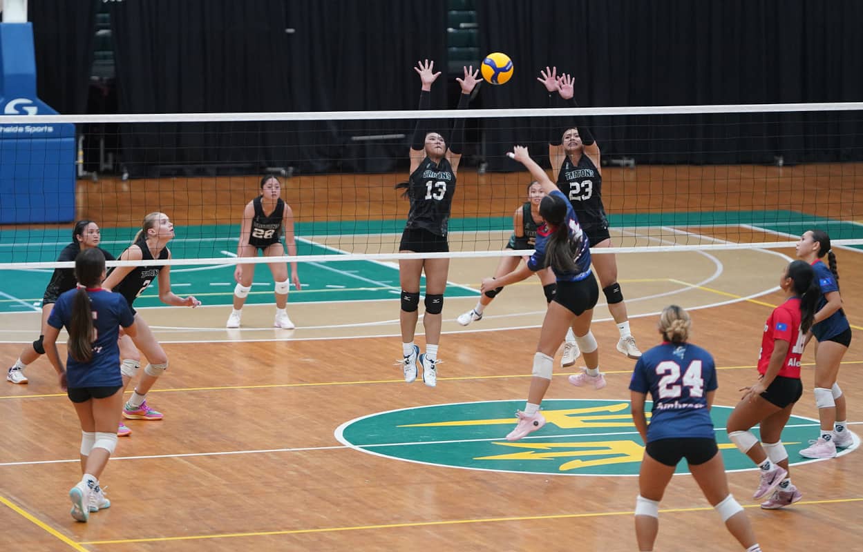 Lady Triton blocking against Guam Pro