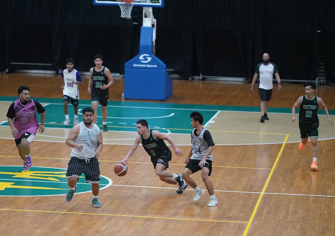UOG Triton dribbling ball