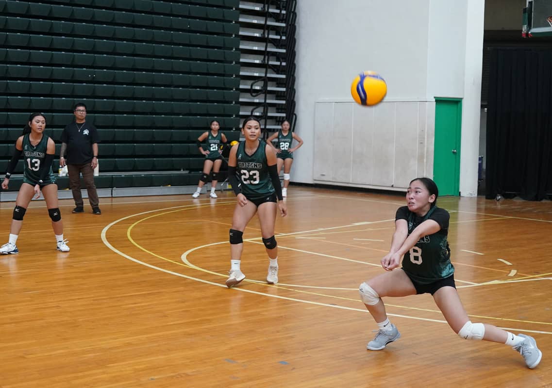 Lady Tritonabout to hit the ball