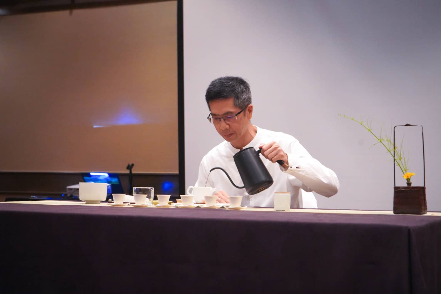 Sze-Wai “Alex” Ng performs a tea preparation demonstration