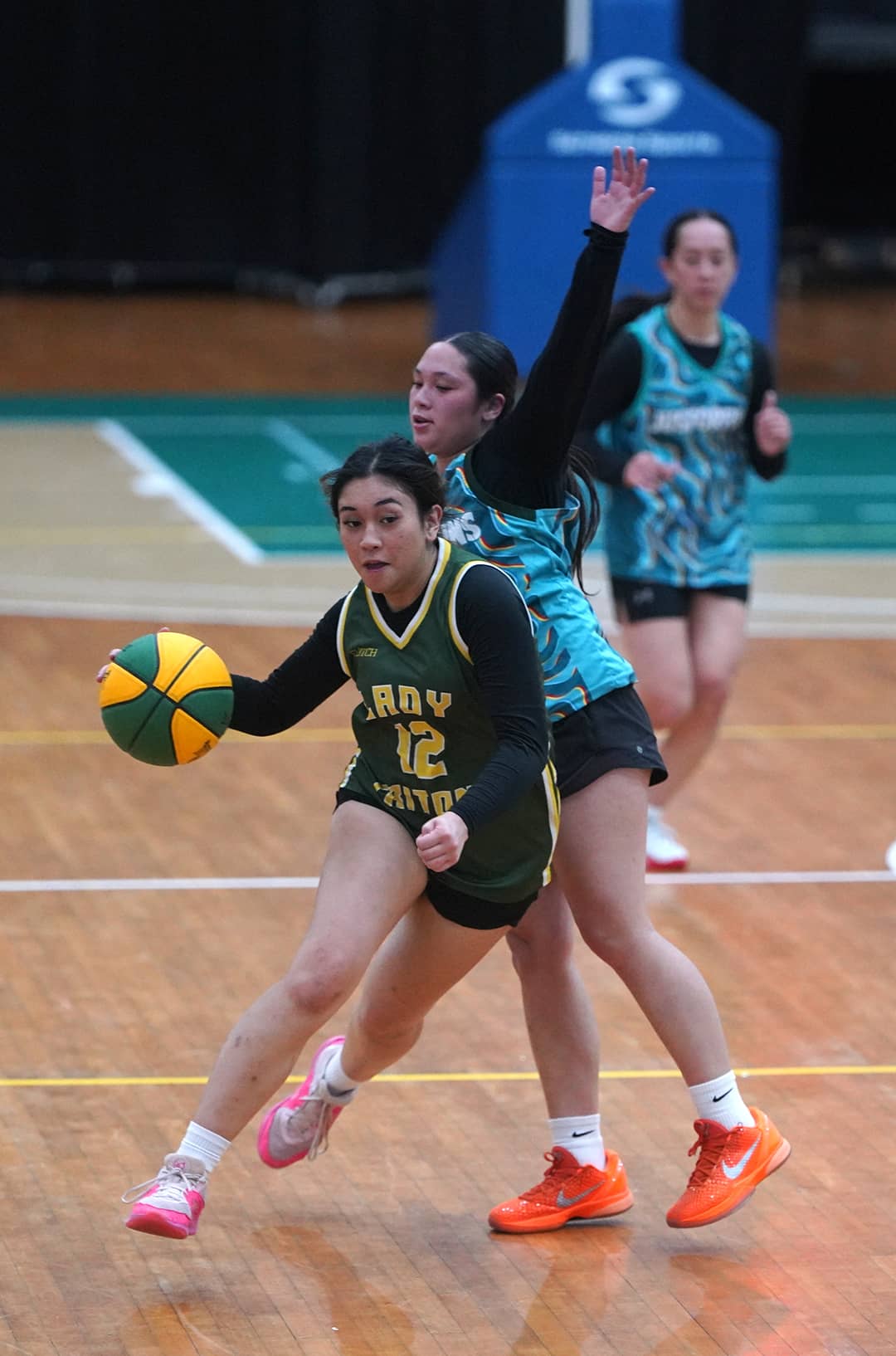 Cheyanna Movida goes into the front court of Lady Tritons