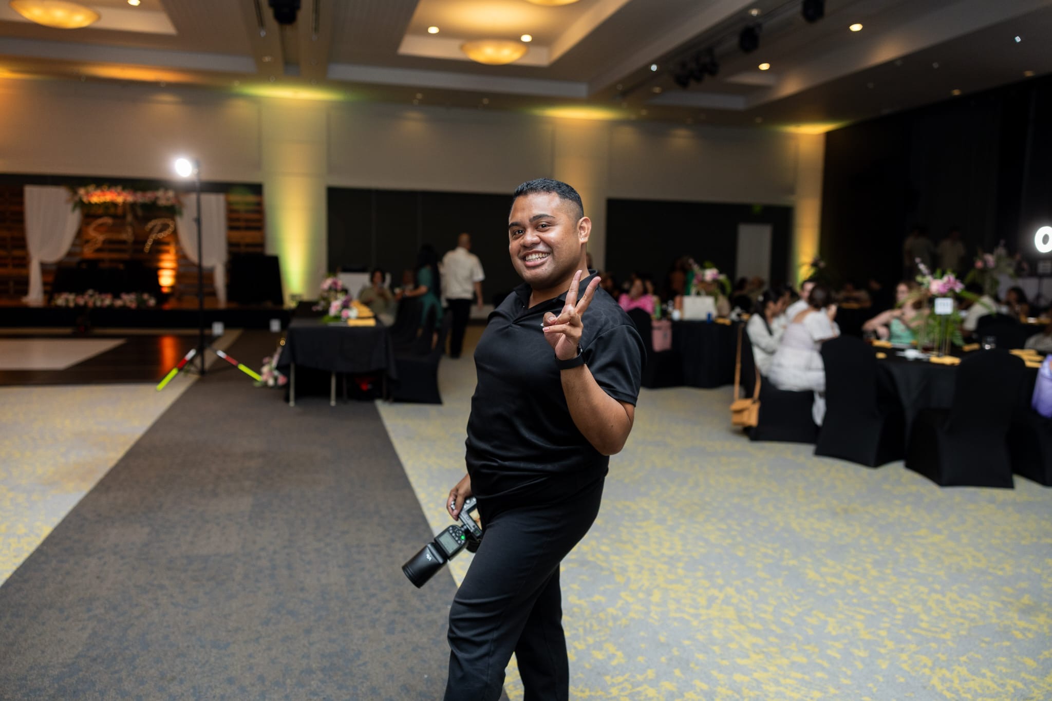 Chance Douglas taking photos at an event