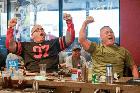 In American football, there are fans—the casual viewers who tune in during game day to cheer on their favorite team. Then, there are superfans—the die-hard followers whose deep devotion extends well beyond the final touchdown at the end of a season. Roland San Nicolas, a librarian and associate professor of library science at the University of Guam, is undoubtedly a superfan. San Nicolas’s love for the San Francisco 49ers is a unique combination of history, family, and an impressive, decades-long memorabilia collection.
 