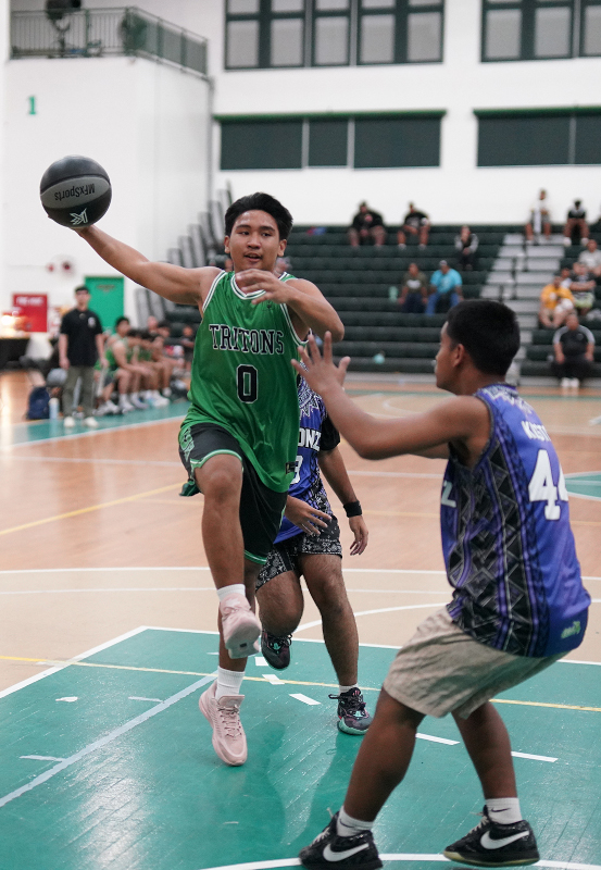 Man shooting a layup