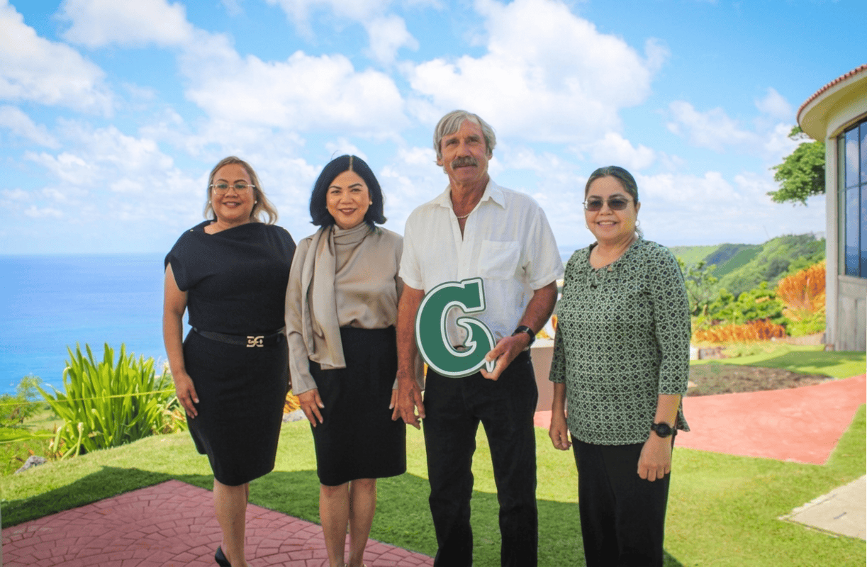 Eflin with UOG leadership